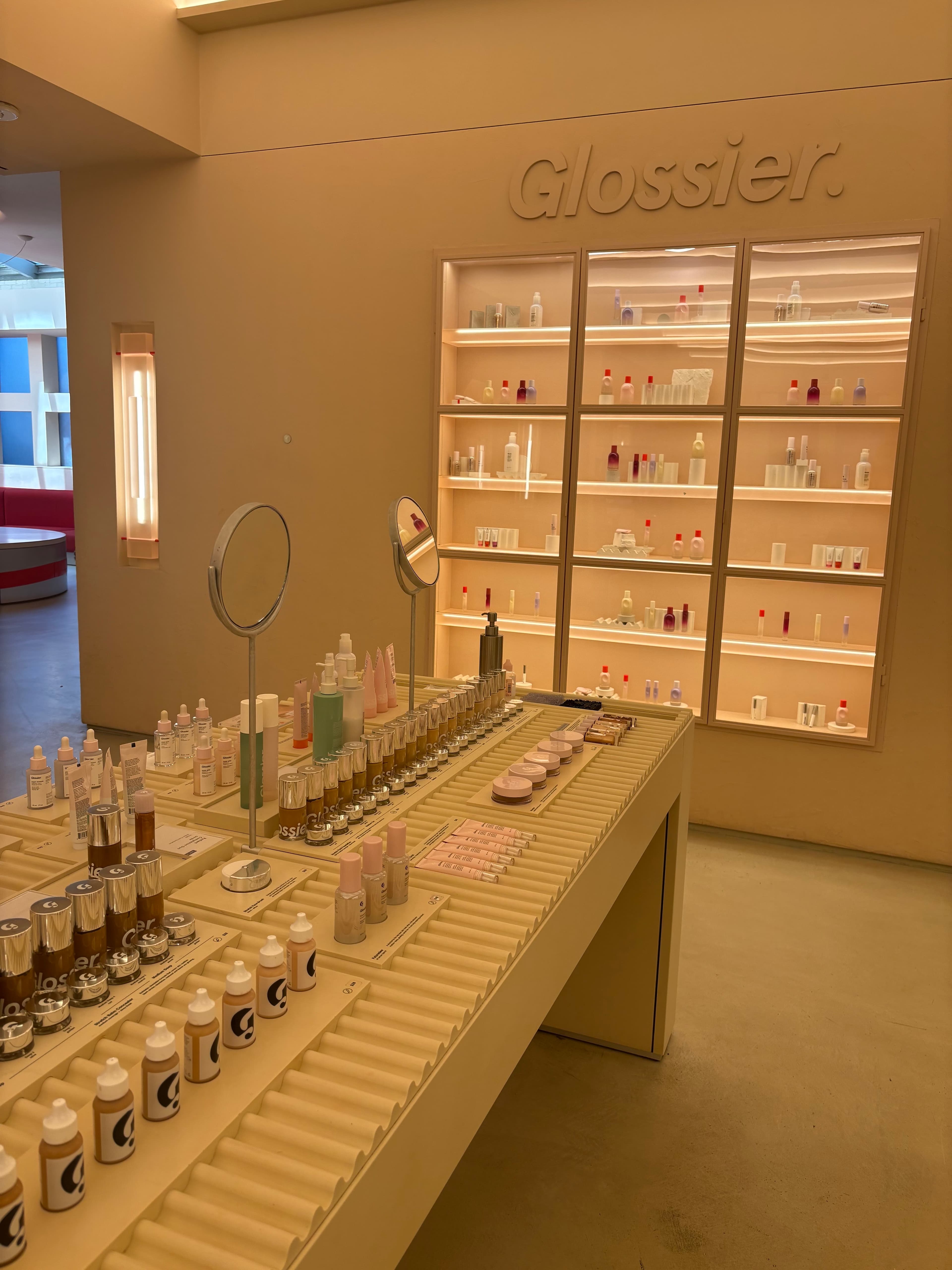 GLOSSIER PRODUCT WALL